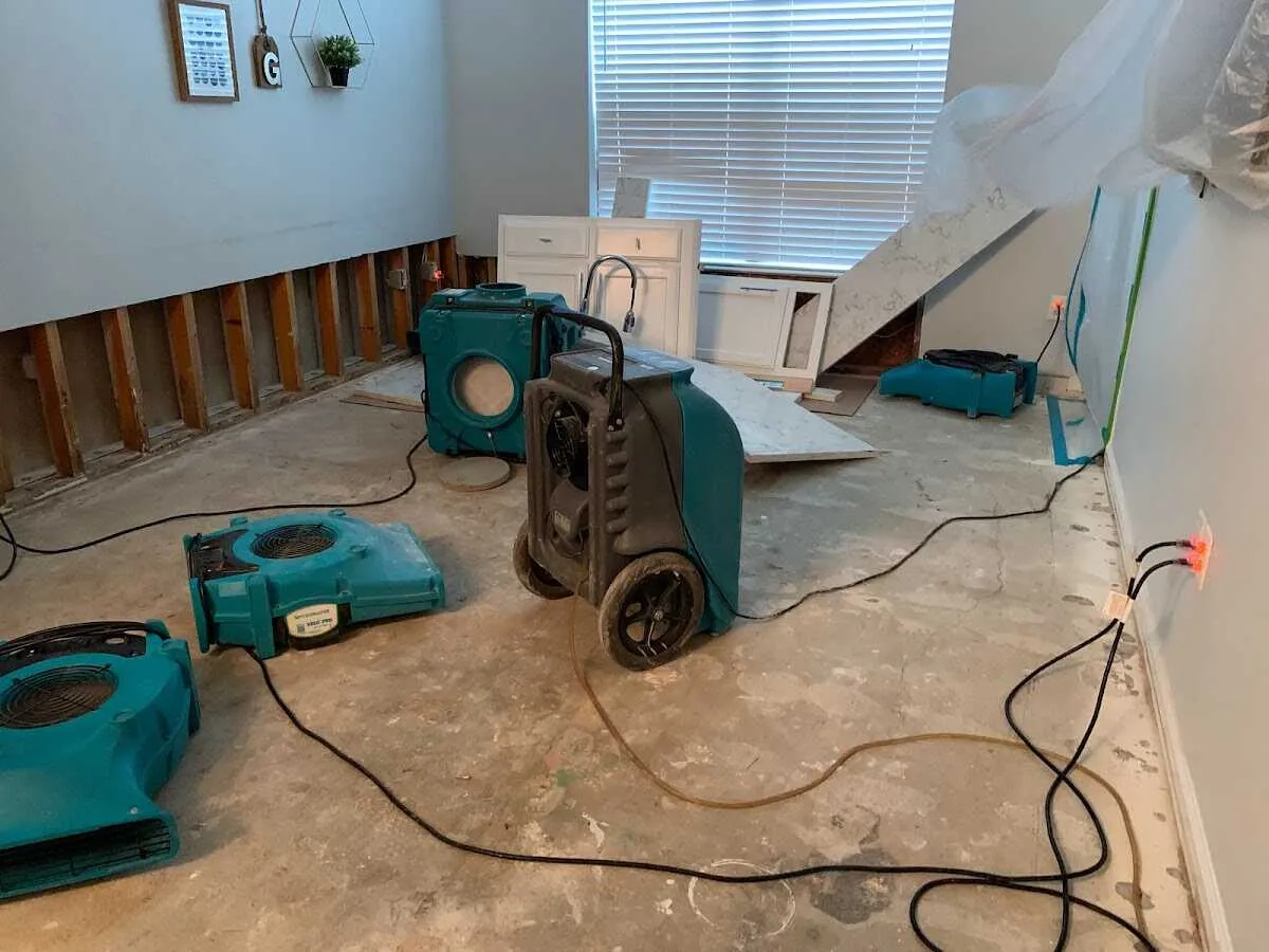 Dehumidifier in flood-cut room for Water Damage Restoration in Anniston